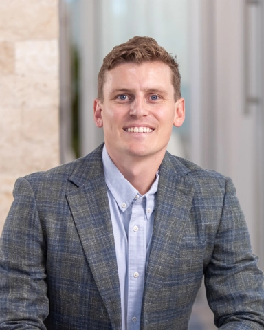 portrait of a smiling person in professional attire